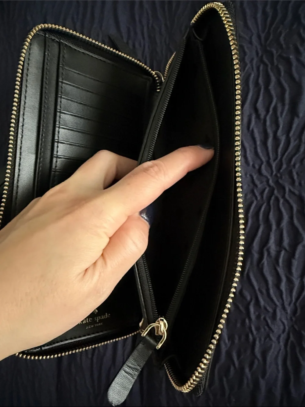 kate spade black pebbled leather wristlet clutch with gold logo